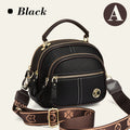 Bolso clásico con múltiples compartimentos y bandolera ancha y ajustable