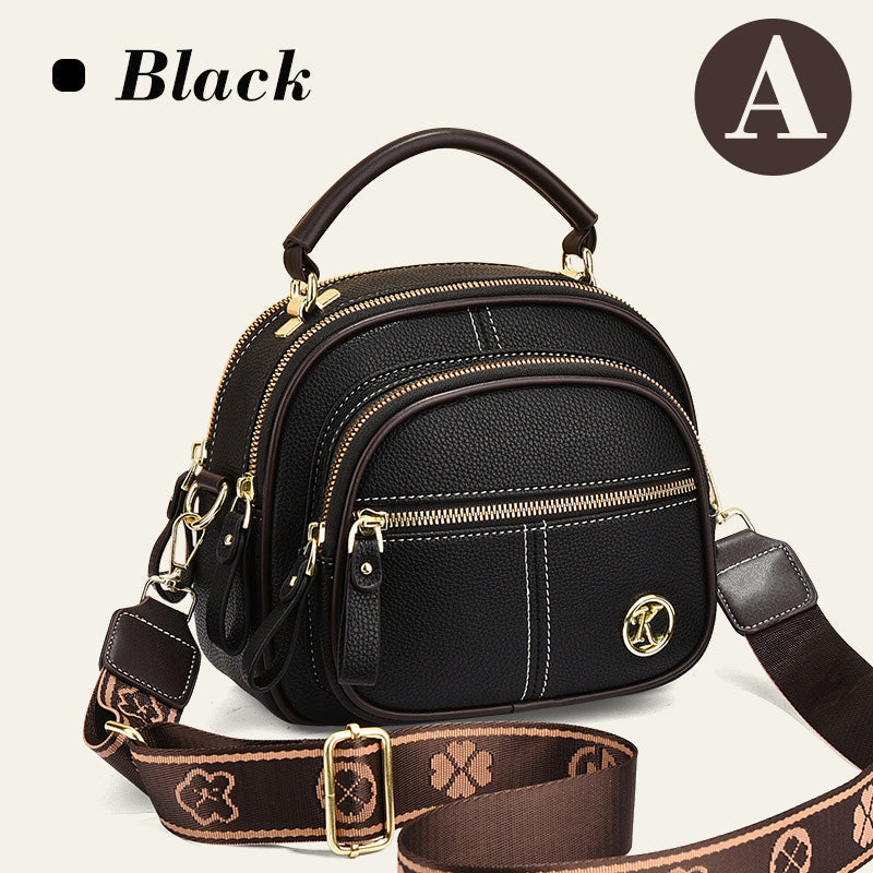 Bolso clásico con múltiples compartimentos y bandolera ancha y ajustable