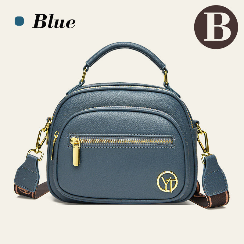 Bolso clásico con múltiples compartimentos y bandolera ancha y ajustable