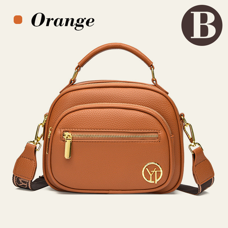 Bolso clásico con múltiples compartimentos y bandolera ancha y ajustable