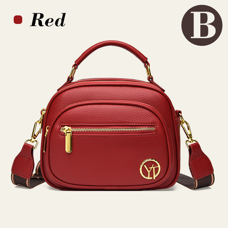 Bolso clásico con múltiples compartimentos y bandolera ancha y ajustable