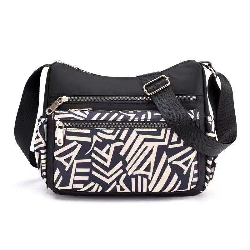 Bolso bandolera con estampado moderno y gran capacidad